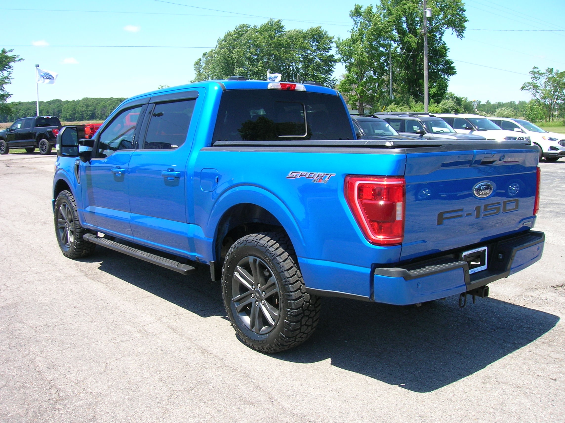 Used 2021 Ford F-150 XLT with VIN 1FTFW1E81MFA99251 for sale in Chesaning, MI