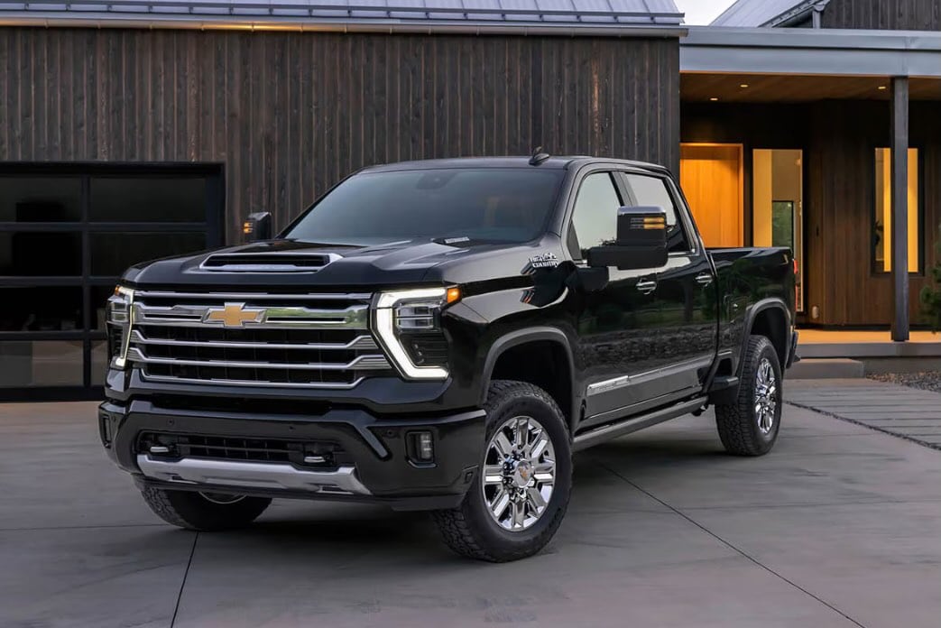  Person cheerfully signing documents.