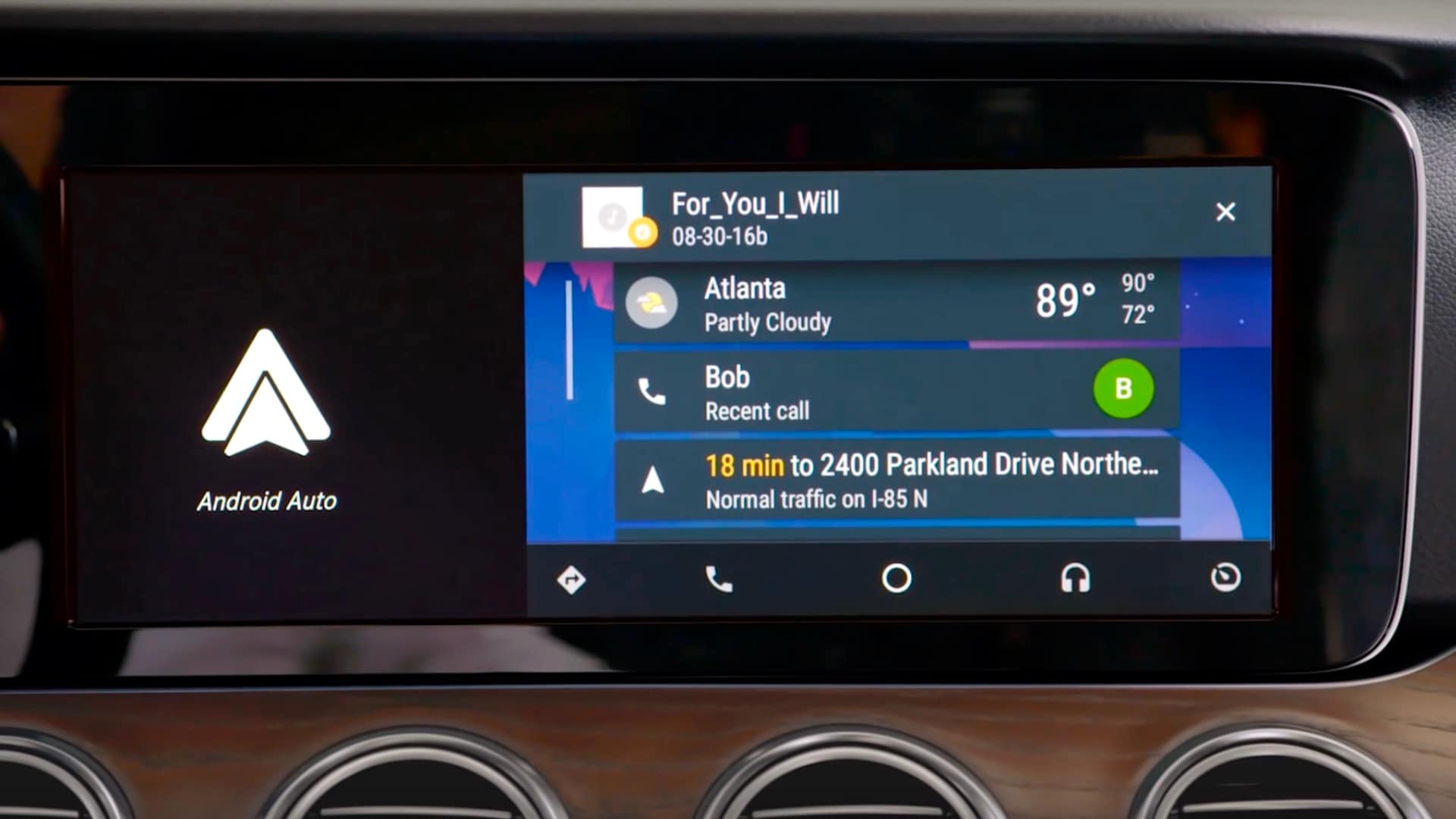 Interior of a Mercedes-Benz vehicle with Android Auto interface visible on touch screen