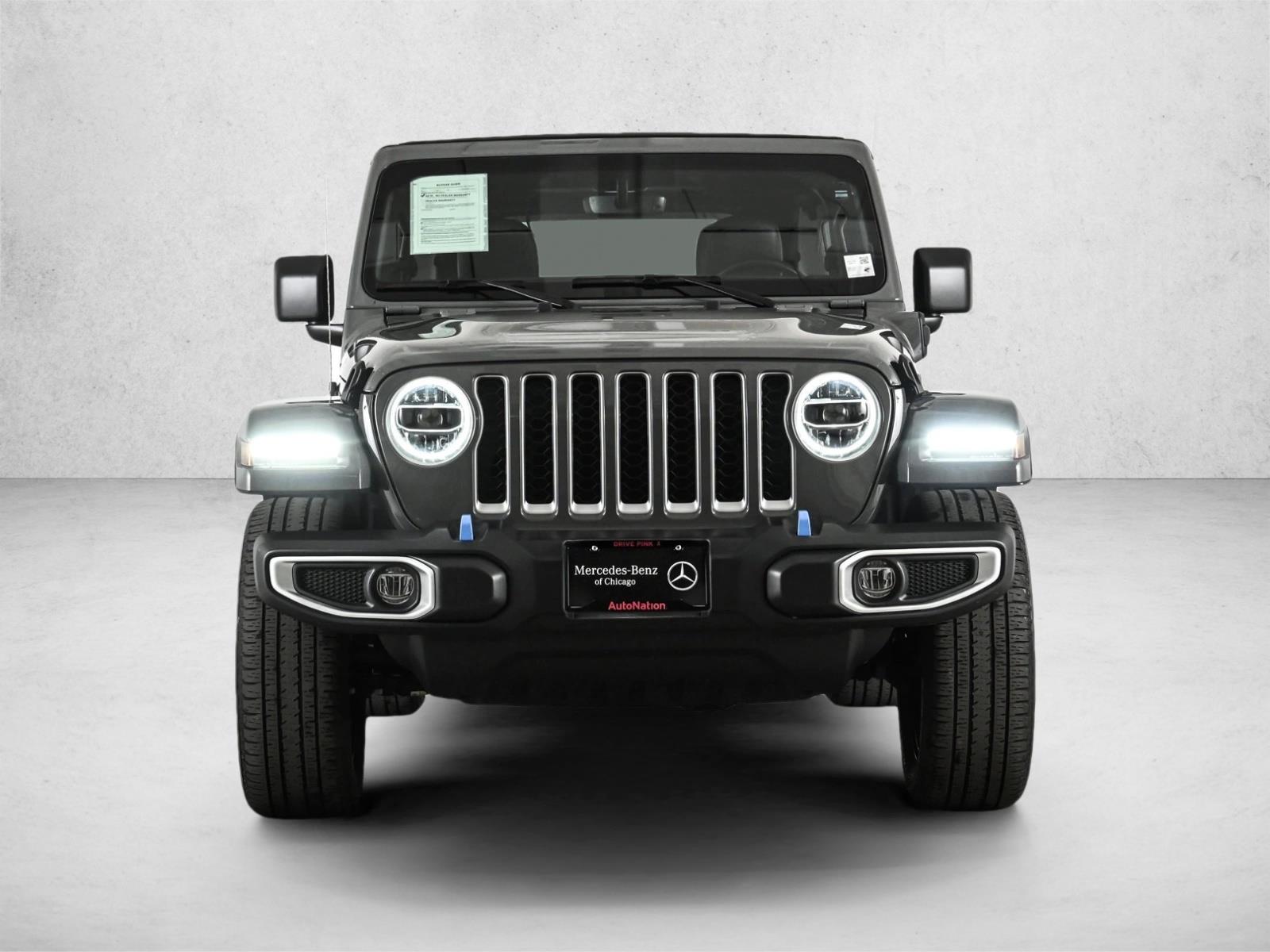 Used 2022 Jeep Wrangler Unlimited Sahara 4XE with VIN 1C4JJXP62NW275555 for sale in Chicago, IL