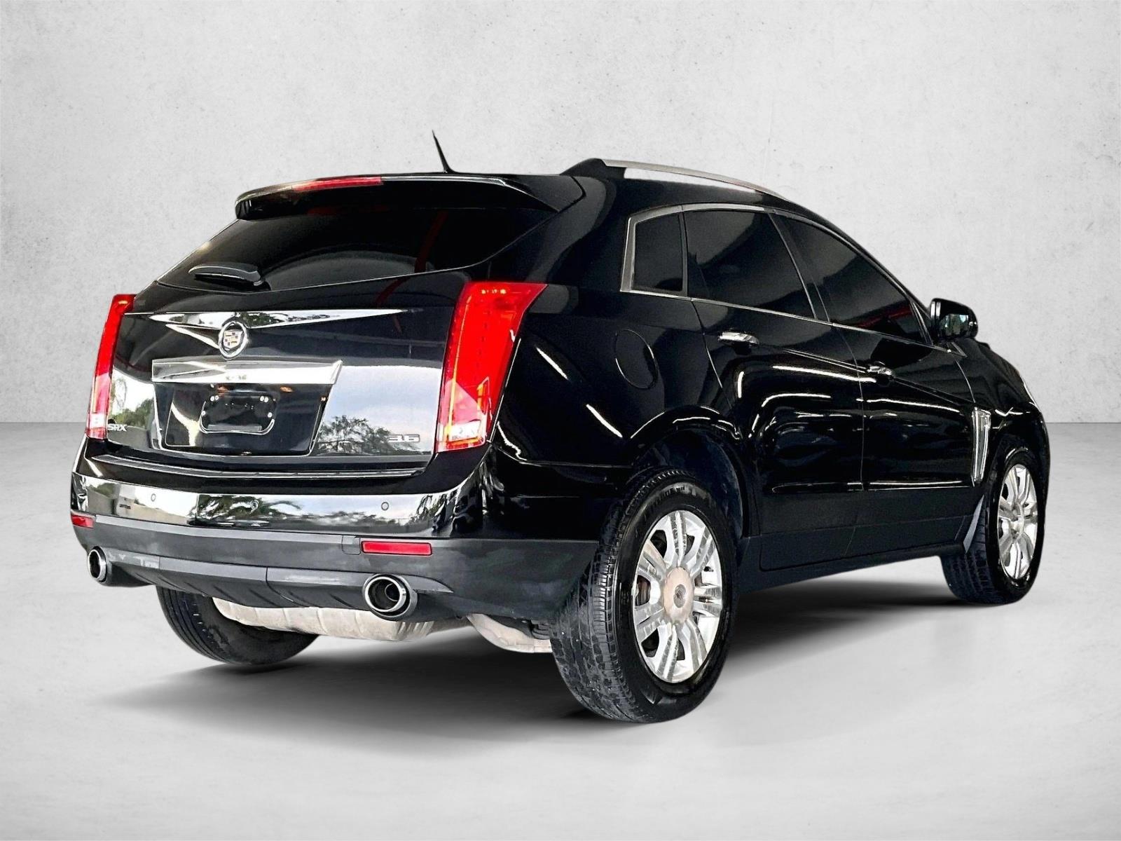 Used 2014 Cadillac SRX Luxury Collection with VIN 3GYFNBE38ES631390 for sale in Coconut Creek, FL