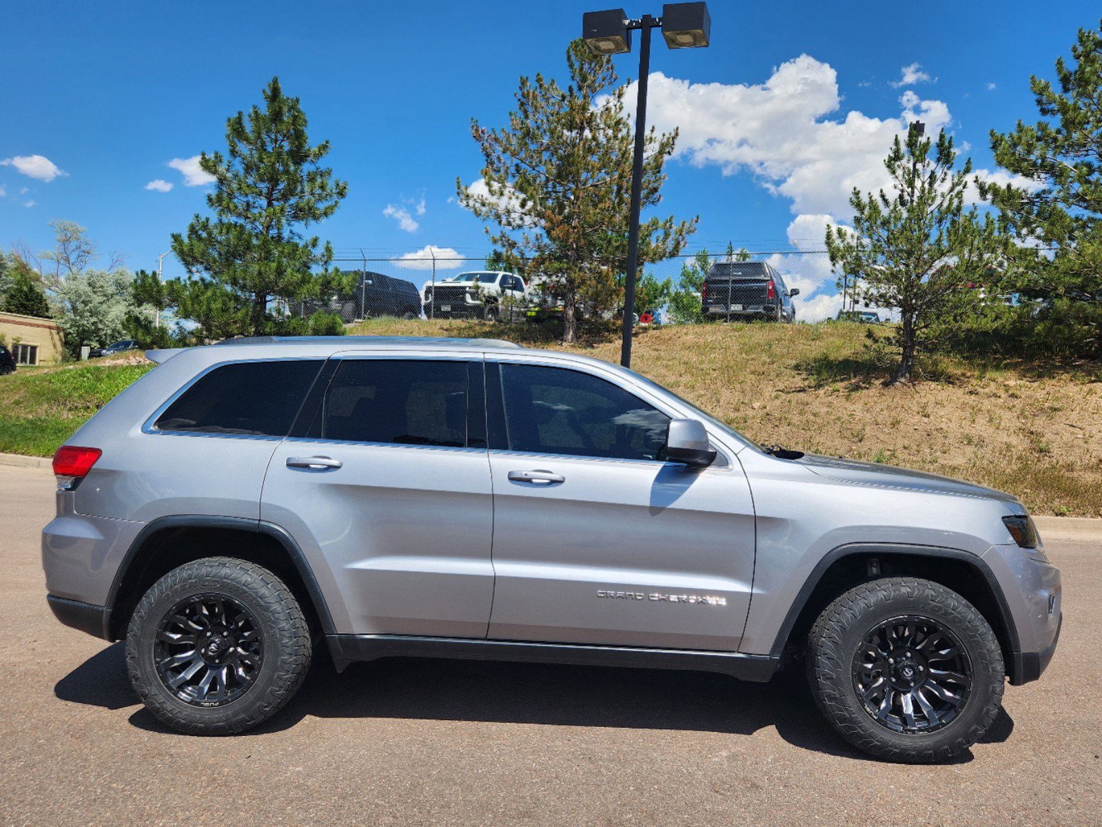 Used 2016 Jeep Grand Cherokee Laredo with VIN 1C4RJFAG6GC303960 for sale in Colorado Springs, CO