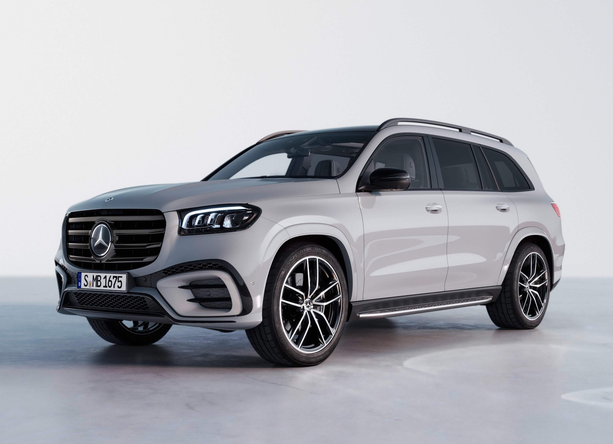 A Mercedes-Benz GLS parked in a white showroom.