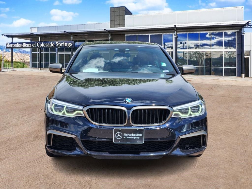 Used 2018 BMW 5 Series M550i with VIN WBAJB9C52JB286091 for sale in Colorado Springs, CO