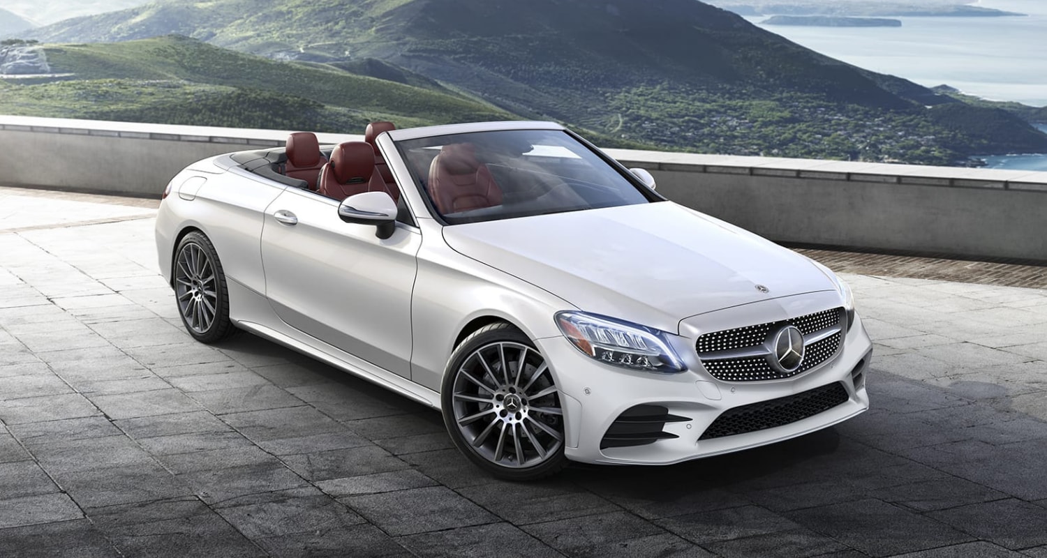 Brand new 2021 Mercedes-Benz C-Class Cabriolet convertible in white exterior color with red leather seats