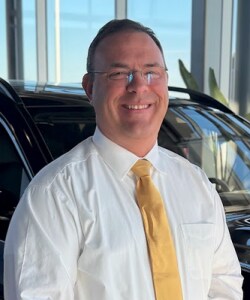 Staff member John Savio from ID_a840e280a398