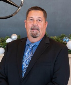 Staff member Charles England from ID_a840e280a398