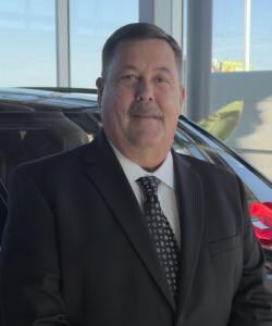 Staff member Charles England from ID_a840e280a398