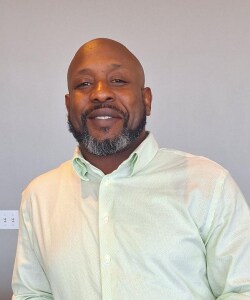 Staff member Raphiell Freelon from ID_a840e280a398