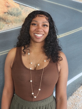 Staff member Natayna Cooper from 56f79fa65146