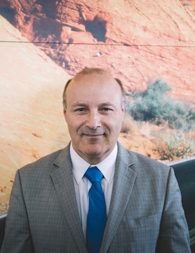 Staff member Jim Vanides from 60f6a28fe65c
