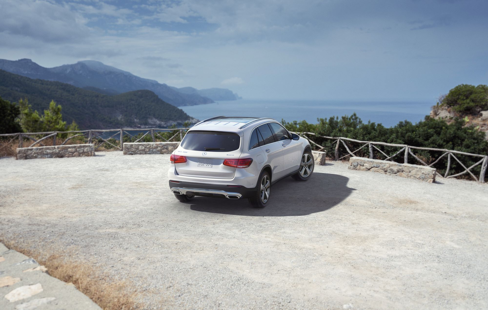  Person cheerfully signing documents.