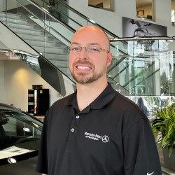 Staff member John Stuart from ID_fbf0d165cca2
