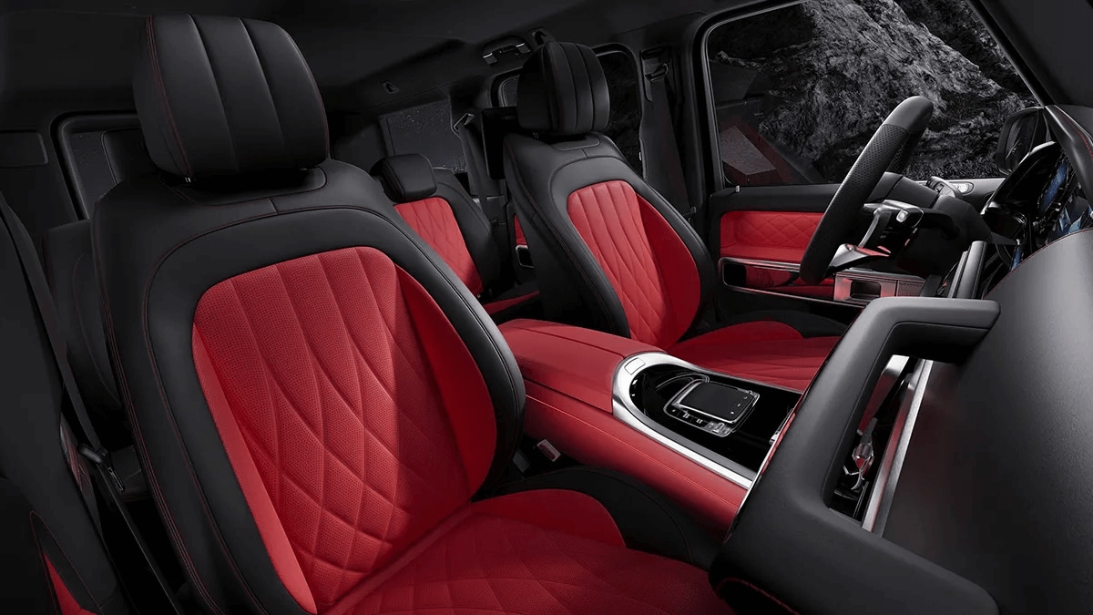 Learn about the seating and cargo capacity of the Mercedes-Benz GLA SUV Rendered image of the second row seats of the Mercedes-Benz G-Class SUV with available MANUFAKTUR red color upgrade