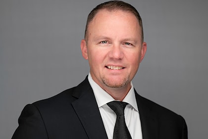 Staff member Dennis Foster from ID_b860f899b3bd
