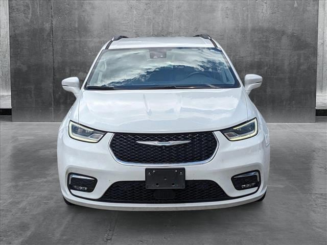 Used 2021 Chrysler Pacifica Hybrid Touring L with VIN 2C4RC1L75MR580712 for sale in Houston, TX