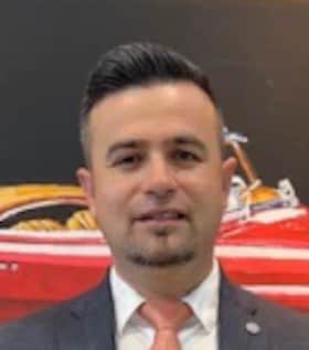 Staff member Tony Xhelo from ID_aa2fe8d34a9e