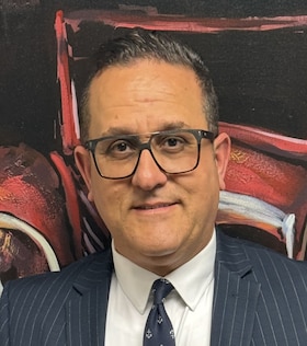 Staff member Sal Al-Toum from ID_aa2fe8d34a9e