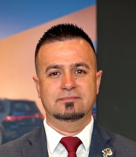 Staff member Tony Xhelo from ID_aa2fe8d34a9e