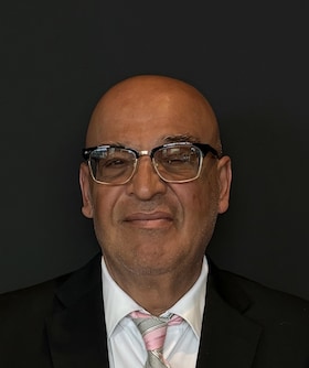 Staff member Mark Zoukan from ID_aa2fe8d34a9e