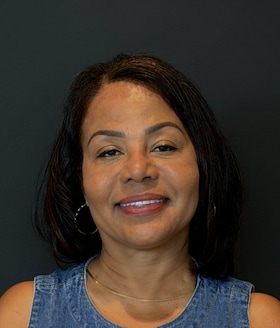 Staff member Jackie Figaro from ID_aa2fe8d34a9e