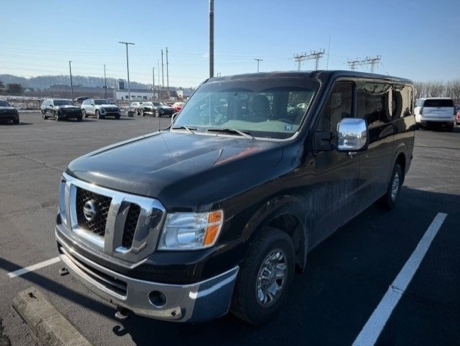 2015 Nissan NV Passenger SL's photo