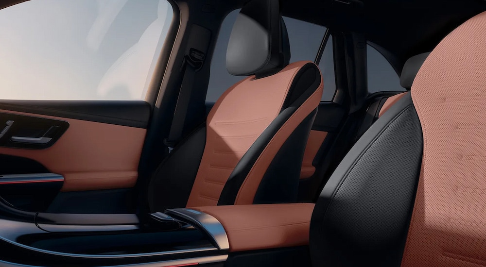 Black and brown upholstery on the front seats of a 2025 Mercedes-Benz GLC for sale.