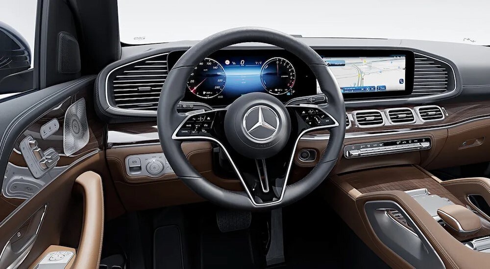 The black and brown interior and dash in a 2024 Mercedes-Benz GLE SUV is shown.