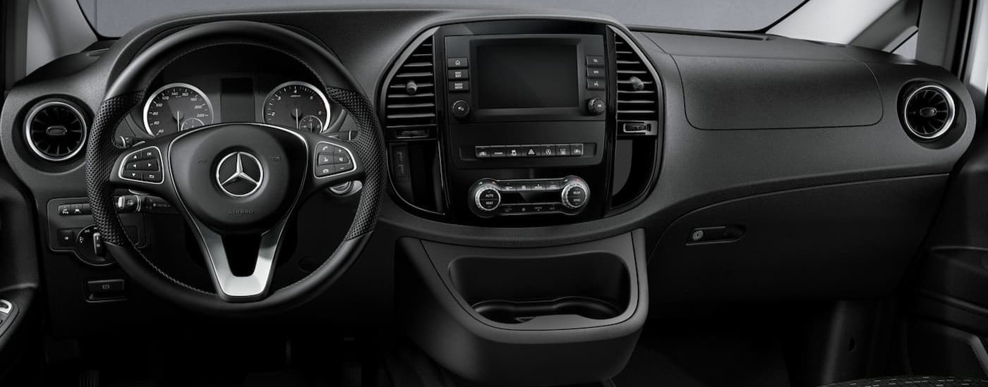 A close-up of the black dash is shown in a 2024 Mercedes-Benz Metris.