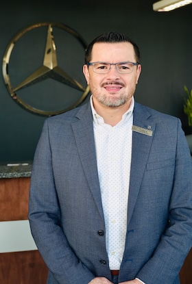 Staff member Tarik Boughamrani from 3292db4a65cd