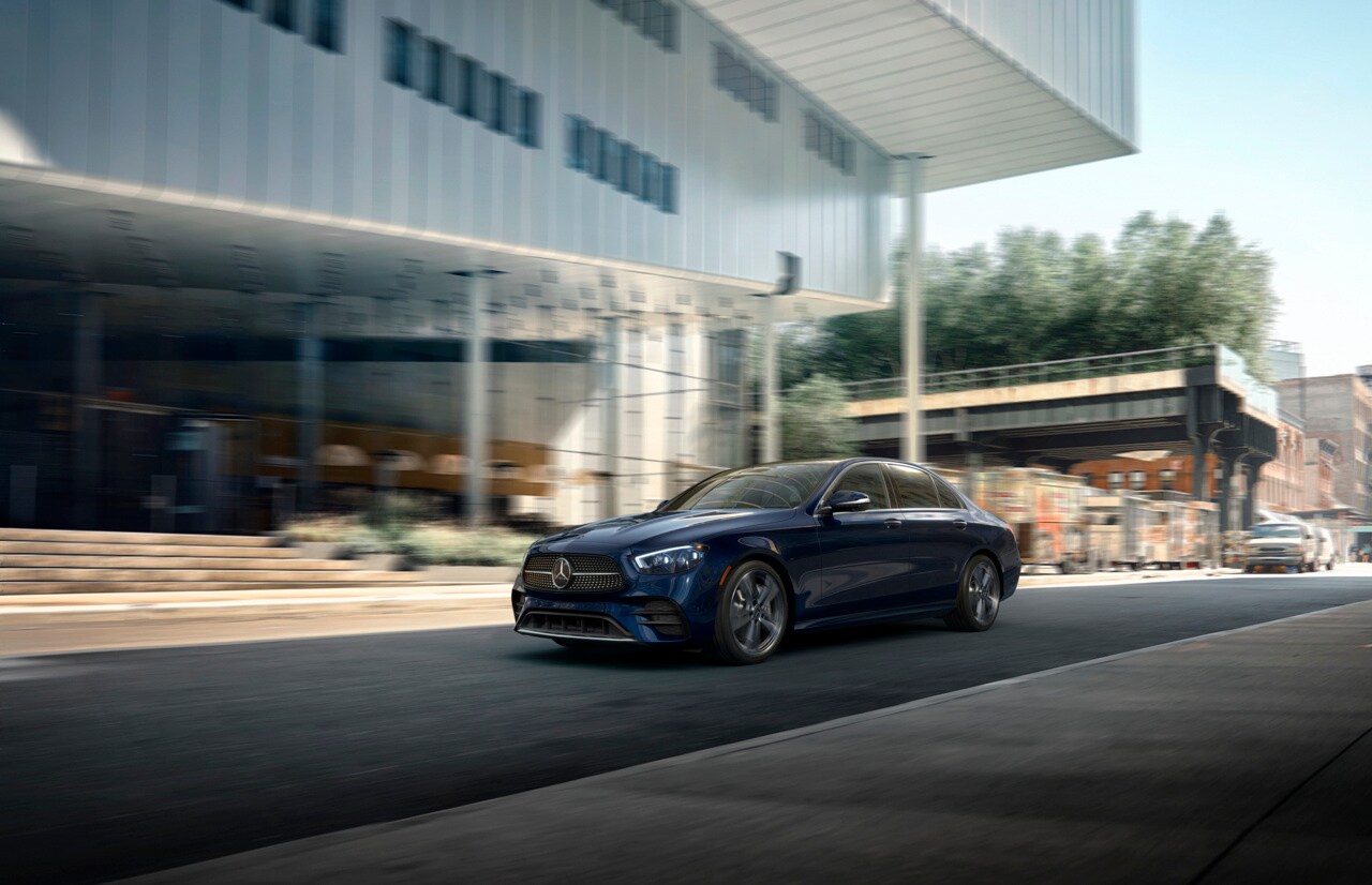Mercedes-Benz E-Class driving through town