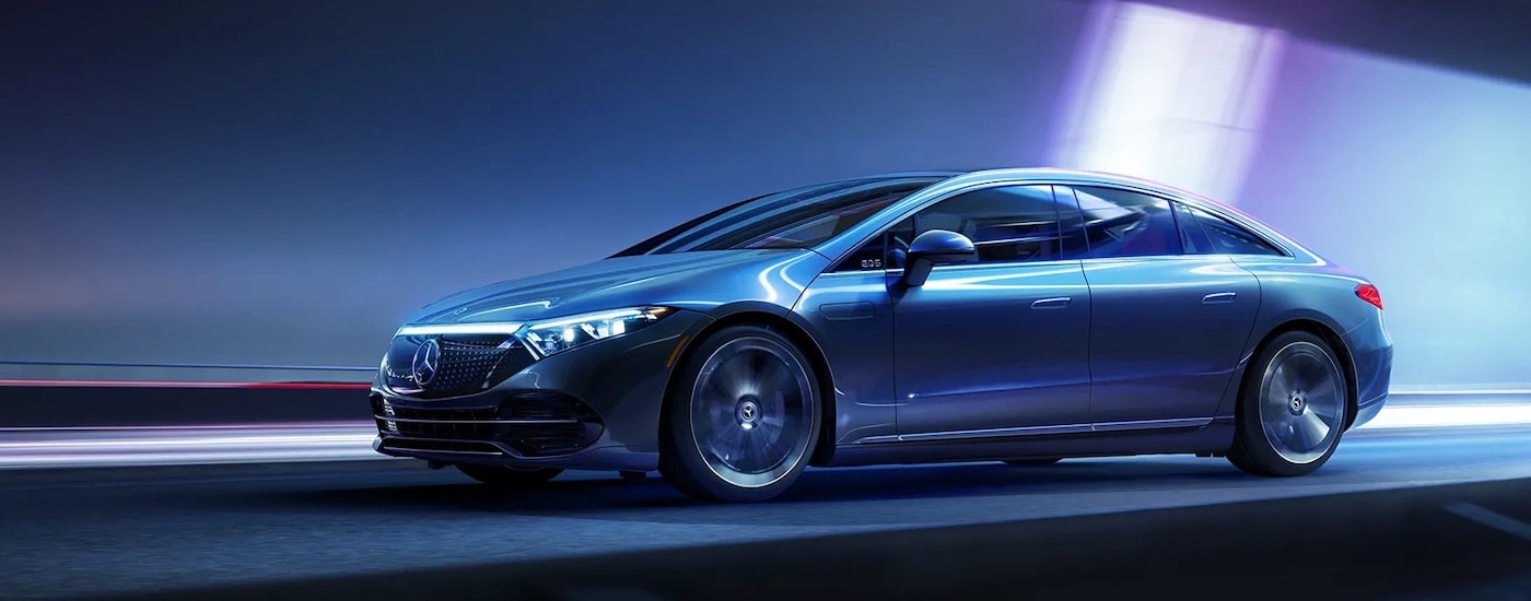 A silver 2024 Mercedes-Benz EQS Sedan is shown from the side.
