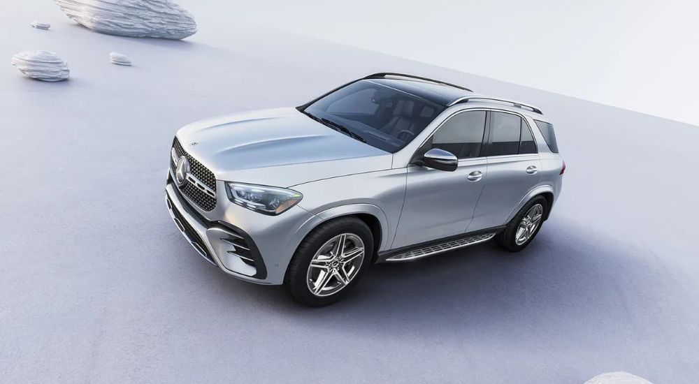 A silver 2024 Mercedes-Benz GLE is shown after leaving a Mercedes-Benz dealer near Crescent City.