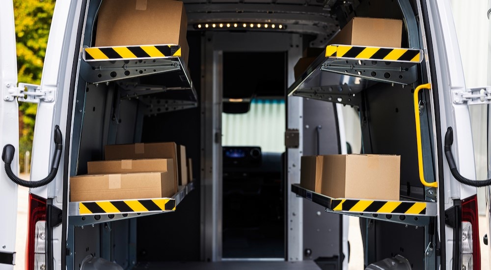 Boxes are shown in the rear cargo area of a white 2024 Mercedes-Benz Sprinter 4500.