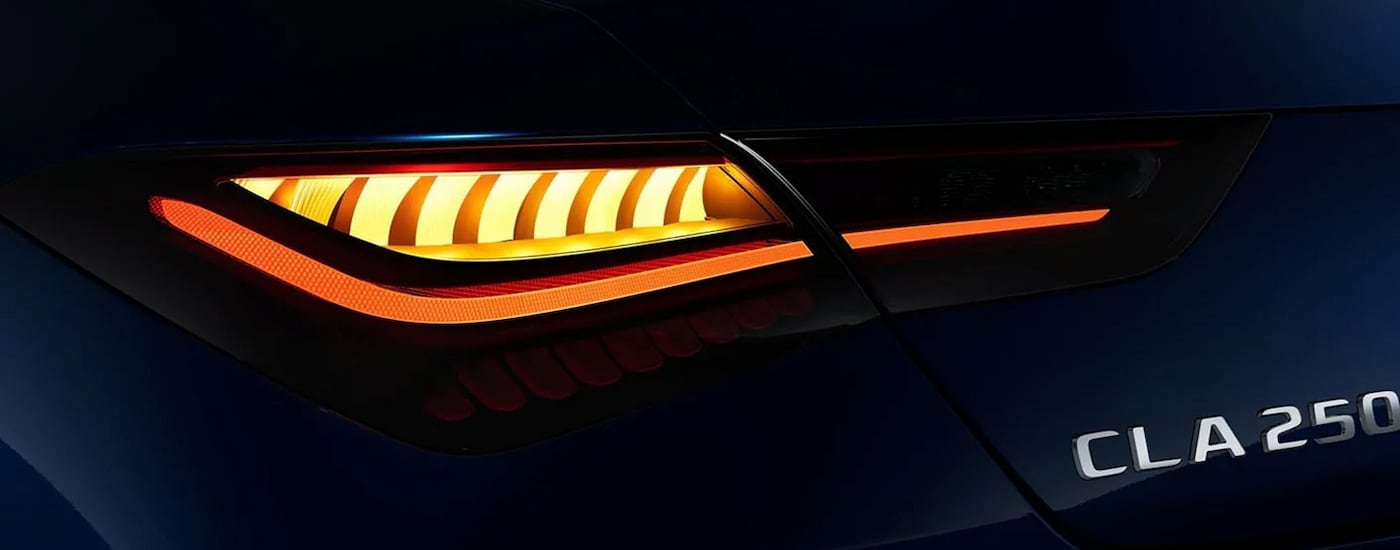 Close-up of the tail light on a blue 2024 Mercedes-Benz CLA 250.