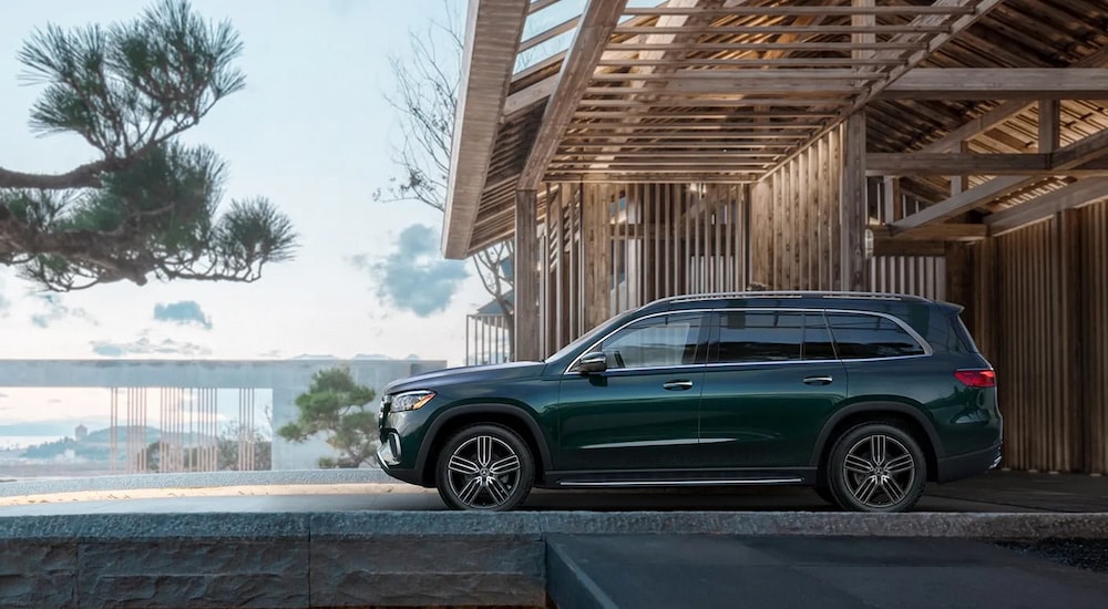 Side view of a green 2025 Mercedes-Benz GLS 450 Exclusive.