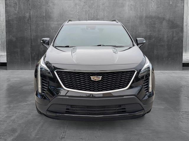 Used 2023 Cadillac XT4 Sport with VIN 1GYFZER4XPF135250 for sale in Miami, FL