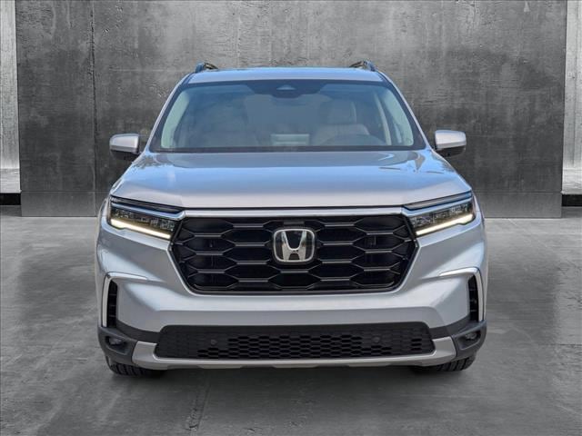 Used 2024 Honda Pilot Touring with VIN 5FNYG2H7XRB013302 for sale in Miami, FL