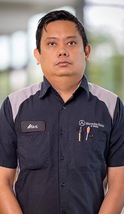 Staff member Alex Agato from 918f519f302b