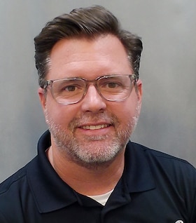 Staff member Tim White from ID_9f92dcd5f68b