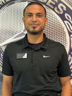 Staff member Anthony Scott from ID_9f92dcd5f68b