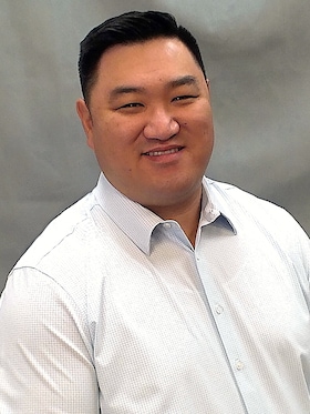 Staff member Brian Pak from ID_5c0cb70785c1