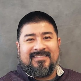 Staff member Eli Garcia from ID_49e54d496c02
