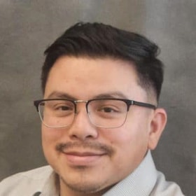Staff member Andrew Solis from ID_49e54d496c02