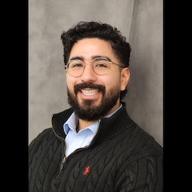 Staff member Roland Castillo from ID_49e54d496c02