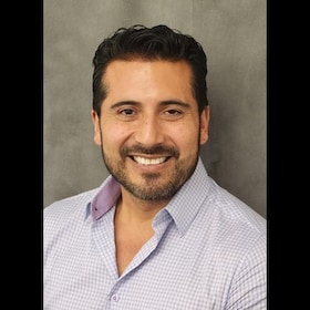 Staff member Alexandro Alvarez from ID_941794348bae
