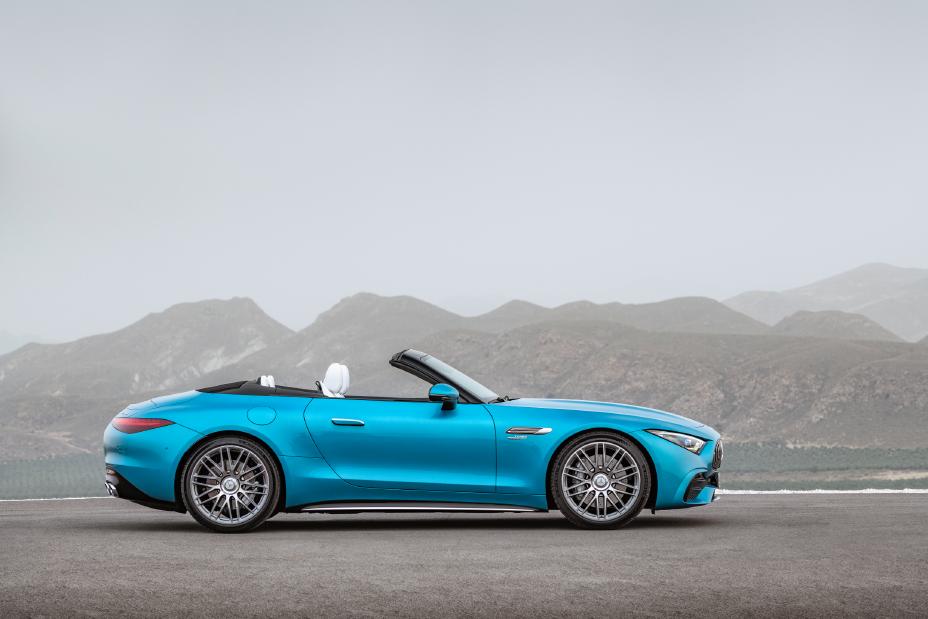 New AMG® SL 43 with New Turbo Technology driving along a coastal road.