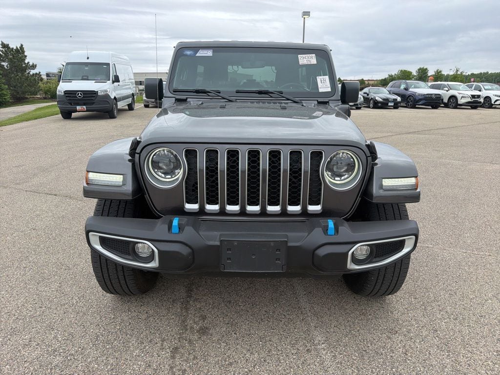 Used 2023 Jeep Wrangler 4xe Sahara 4XE with VIN 1C4JJXP69PW599492 for sale in Rochester, Minnesota
