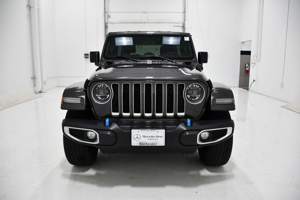 Used 2023 Jeep Wrangler 4xe Sahara 4XE with VIN 1C4JJXP69PW599492 for sale in Rochester, Minnesota