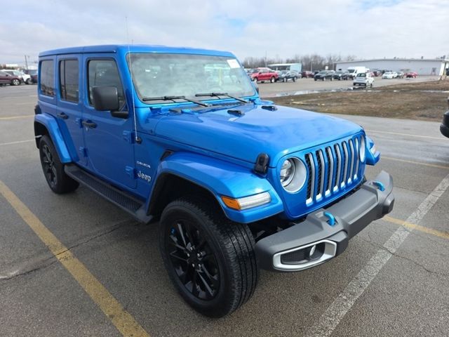 Used 2023 Jeep Wrangler 4xe Sahara 4XE with VIN 1C4JJXP68PW554186 for sale in Rochester, Minnesota